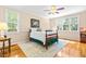Cozy bedroom with natural light and ceiling fan at 509 Fish Pond Ct, Rolesville, NC 27571
