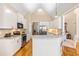 Modern kitchen featuring white cabinets, stainless steel appliances, and granite countertops at 509 Fish Pond Ct, Rolesville, NC 27571