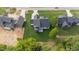 Aerial view showcasing the backyard, patio, and lush landscaping of this beautiful home at 525 Allesandra Dr, Clayton, NC 27527