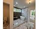 Elegant bathroom with modern fixtures, a walk-in shower, and a soaking tub for a spa-like experience at 525 Allesandra Dr, Clayton, NC 27527