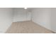 A light-filled bedroom showcases white trim, doors, and a neutral carpet at 525 Allesandra Dr, Clayton, NC 27527