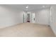 A spacious bedroom with neutral carpet, ample closet space, and multiple entryways for convenience at 525 Allesandra Dr, Clayton, NC 27527