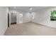 Expansive bedroom with plush carpeting, complemented by an ensuite bath and walk-in closet at 525 Allesandra Dr, Clayton, NC 27527