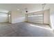 Spacious two-car garage with finished walls and ceiling and insulated garage doors at 525 Allesandra Dr, Clayton, NC 27527