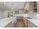 Gorgeous kitchen with island, farm sink, and gas range at 525 Allesandra Dr, Clayton, NC 27527