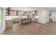 Stylish kitchen with island, modern appliances, and marble backsplash at 525 Allesandra Dr, Clayton, NC 27527