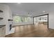Spacious living room with fireplace, wood floors, and natural light at 525 Allesandra Dr, Clayton, NC 27527