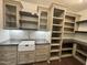 Wonderful open pantry includes a sink, lots of shelves, and counter space at 525 Allesandra Dr, Clayton, NC 27527