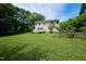 Spacious backyard of home offering lush greenery and open space for outdoor activities at 5401 Lower Creek Ct, Apex, NC 27539