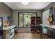 Home office with a large bay window, hardwood floors and natural light at 5604 Hideaway Dr, Chapel Hill, NC 27516
