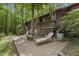 Inviting backyard patio area perfect for outdoor relaxation and entertaining at 5604 Hideaway Dr, Chapel Hill, NC 27516