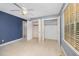 Bedroom with closet storage, neutral carpet and a ceiling fan at 5804 Heatherbrook Cir, Raleigh, NC 27612