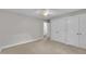 Bedroom featuring a ceiling fan and double closets with doors at 5804 Heatherbrook Cir, Raleigh, NC 27612