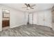 Bedroom with a ceiling fan, closet storage and an ensuite bath at 5804 Heatherbrook Cir, Raleigh, NC 27612