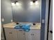 Bathroom with double sink vanity and overhead lighting at 60 Stream View Way, Spring Hope, NC 27882