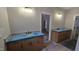 Bathroom with double sink vanity, modern fixtures, and a doorway to another room at 60 Stream View Way, Spring Hope, NC 27882