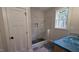 Tiled shower with built-in niche and a hexagon tiled floor at 60 Stream View Way, Spring Hope, NC 27882