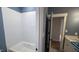 Bathroom features a white tiled tub and shower combo at 60 Stream View Way, Spring Hope, NC 27882