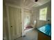 Modern bathroom featuring a tiled shower with glass door and a built-in bench at 60 Stream View Way, Spring Hope, NC 27882