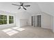 Bedroom features carpet flooring, a ceiling fan, and an attached closet at 60 Stream View Way, Spring Hope, NC 27882