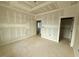 Unfinished bedroom primed and ready with trim work and an opening for a walk-in closet at 60 Stream View Way, Spring Hope, NC 27882