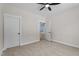 Bedroom with neutral carpet, showcasing doors and entryways within the home at 60 Stream View Way, Spring Hope, NC 27882