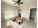 The bedroom features a ceiling fan, neutral walls, and an attached closet, awaiting your personal touch at 60 Stream View Way, Spring Hope, NC 27882