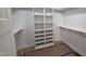 Walk-in closet with white shelving and ample storage space at 60 Stream View Way, Spring Hope, NC 27882