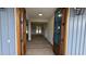 View through the front door opening into a spacious interior with abundant natural light at 60 Stream View Way, Spring Hope, NC 27882
