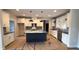 Beautiful kitchen with white cabinetry, granite countertops, and a central island with dark accents at 60 Stream View Way, Spring Hope, NC 27882