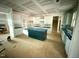 Spacious kitchen featuring white cabinets, a center island with dark base and ample counter space at 60 Stream View Way, Spring Hope, NC 27882
