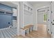Mudroom featuring storage and bench seating, offering functionality and convenience at 60 Stream View Way, Spring Hope, NC 27882
