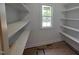 Walk-in pantry with built-in shelving, providing ample storage space at 60 Stream View Way, Spring Hope, NC 27882