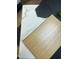 Assortment of refined tile and wood samples, featuring marble, woodgrain, and hexagonal patterns for custom design at 60 Stream View Way, Spring Hope, NC 27882