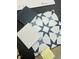 Tile selections featuring geometric patterns, white tiles, and gray tiles, ideal for a modern home design at 60 Stream View Way, Spring Hope, NC 27882