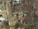 Aerial view outlining property lines, showcasing the house and surrounding landscape at 605 Mace Rd, Mebane, NC 27302