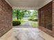 Outdoor covered carport leading to the home's driveway at 605 Mace Rd, Mebane, NC 27302