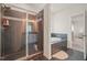 Well-appointed bathroom with a large glass shower and luxurious soaking tub at 672 Millers Mark Ave, Wake Forest, NC 27587
