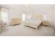 Bright bedroom with neutral decor, soft natural light and comfortable furnishings at 672 Millers Mark Ave, Wake Forest, NC 27587
