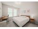 Comfortable bedroom featuring a window with natural light, and carpet floors at 672 Millers Mark Ave, Wake Forest, NC 27587