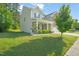 Charming two-story home with a welcoming front porch and landscaped yard offers curb appeal at 672 Millers Mark Ave, Wake Forest, NC 27587