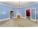 Living room featuring a fireplace and natural light at 6720 Dwight Rowland Rd, Willow Springs, NC 27592