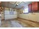 Spacious garage with automatic door opener and built-in shelving at 75 Hartwell Cir, Lillington, NC 27546