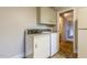 Convenient laundry area equipped with a washer and dryer, plus storage at 75 Hartwell Cir, Lillington, NC 27546