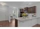 Modern kitchen with granite countertops, stainless steel appliances, and ample cabinet space at 7871 Allscott Way, Raleigh, NC 27612