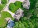Beautiful aerial view of a home, highlighting its deck and lush green surroundings at 7929 Pine Timber Dr, Raleigh, NC 27613