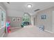 Spacious, naturally lit bonus room with a cozy feel, perfect for many activities at 7929 Pine Timber Dr, Raleigh, NC 27613