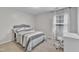 Well-lit bedroom with modern furniture and comfortable seating under the light filtering window at 8504 Delavan Cir, Raleigh, NC 27613