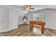 Bonus room with wood floors, foosball table, hanging chair, ceiling fan and natural light at 8504 Delavan Cir, Raleigh, NC 27613