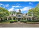 Charming community clubhouse with well-manicured landscaping, creating a welcoming and inviting atmosphere at 8504 Delavan Cir, Raleigh, NC 27613